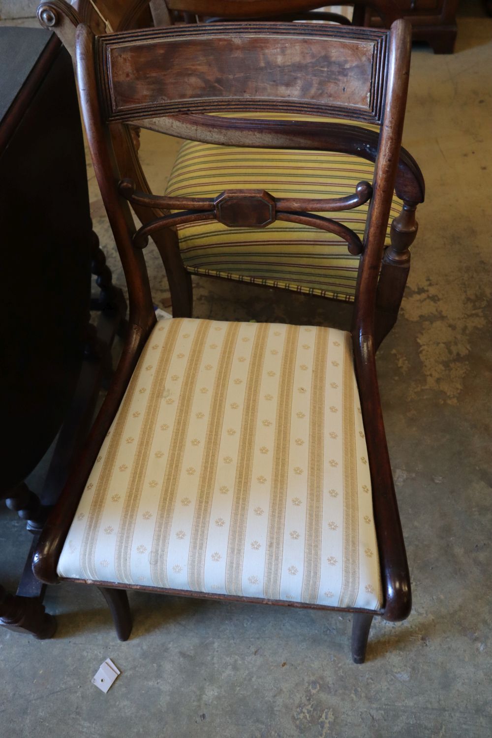 A Regency mahogany carver and a pair of dining chairs (3)